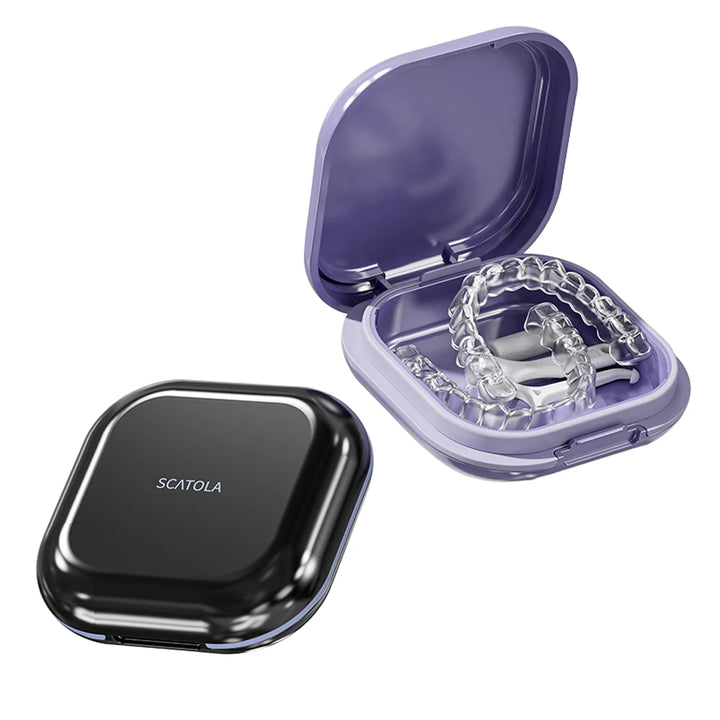 Closed black case and open purple case holding a pair of aligners (purple not sold here)
