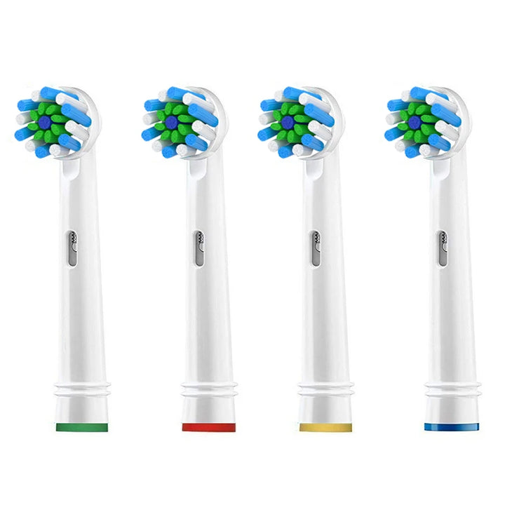 Quattro testine compatibili Oral-B a setole incrociate, anelli verde, rosso, giallo e blu