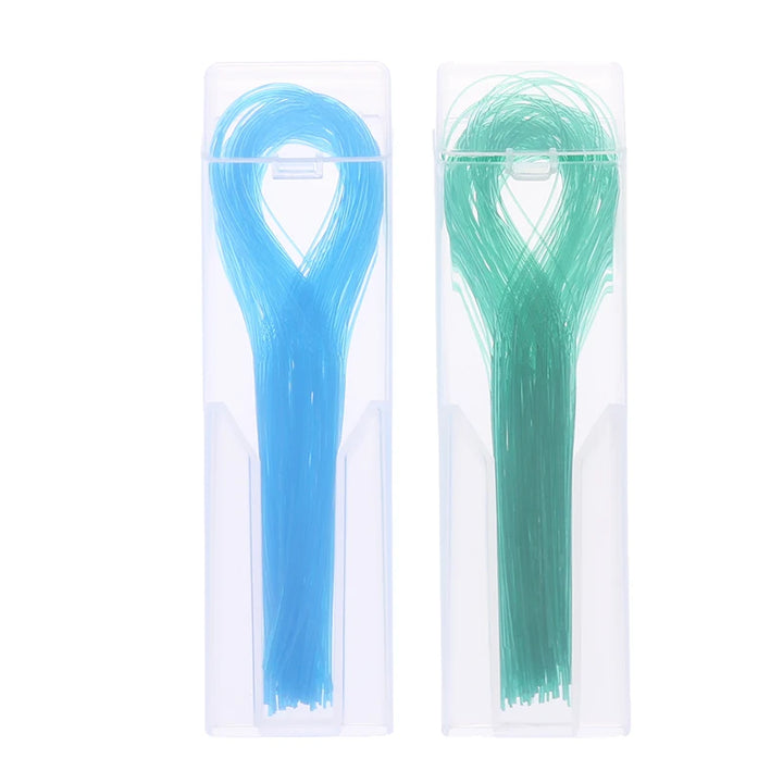 Two boxes of floss threaders, blue and green (only blue is available)
