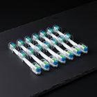 Brossettes de rechange ×10 ÉclatDent : Les brossettes de rechange sur une ardoise noire, fond sombre