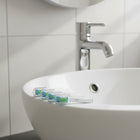 Brossettes de rechange ×10 ÉclatDent : Les brossettes de rechange au bord d'un lavabo de salle de bain