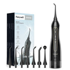 Hydropulseur oral haute performance 5020E ÉclatDent avec sa boîte et ses sept canules interchangeables