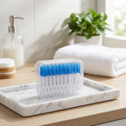 Soft interdental picks — on a white marble tray in a bright bathroom