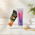 Duo Douceur Sakura ÉclatDent : sur un plateau de marbre avec une serviette blanche et une plante verte