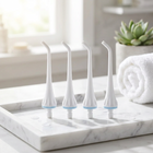 Beccucci compatibili Fairywill 5020E — su un vassoio di marmo bianco in un bagno luminoso