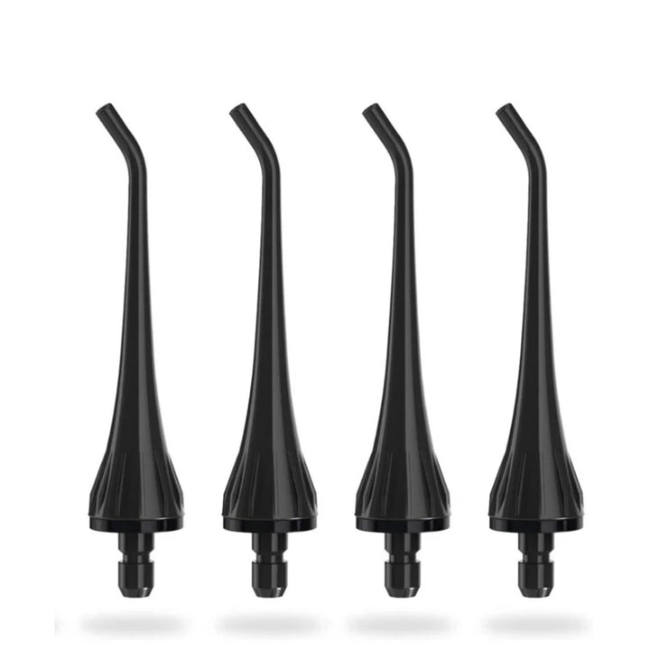 Quattro beccucci standard neri, compatibili con l’idropulsore Fairywill 5020E, allineati su fondo bianco (il set ne contiene otto)