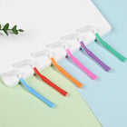 Six manches de couleur avec capuchons transparents (le vert n’est pas proposé en sachet)