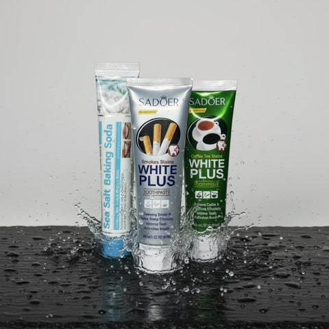 Pack Best-Seller Blanchissant ÉclatDent : les trois dentifrices sur une ardoise humide avec éclaboussures d'eau