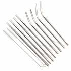 Reusable stainless steel straws — on a white background
