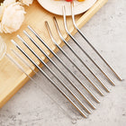 Eight silver stainless steel straws, four straight and four bent, with two cleaning brushes