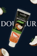 Dentifrice Blancheur Douceur Coco ÉclatDent sur fond bleu nuit avec le mot DOUCEUR