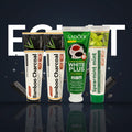 Pack Splendore Carbone — 4 dentifrici ÉclatDent: i quattro tubetti sospesi davanti alla parola ÉCLAT su sfondo blu notte
