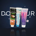 Pack Gengive & Dolcezza — 3 dentifrici ÉclatDent: i tre tubetti sospesi davanti alla parola DOUCEUR su sfondo blu notte